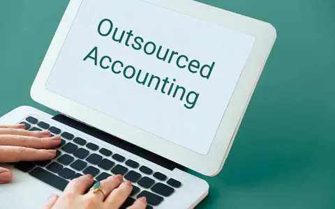 How can outsourced bookkeeping help improve financial management?
