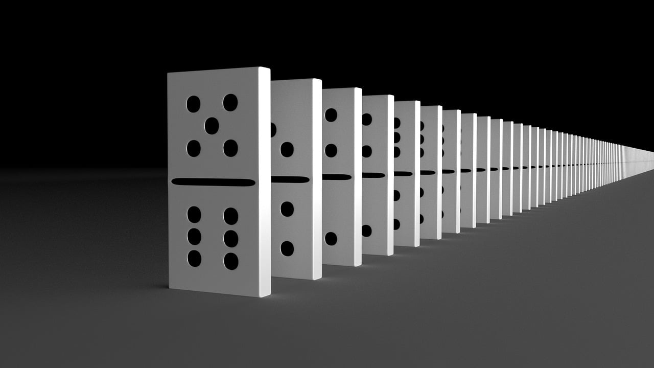 Paving the Path to Victory in Dominoes